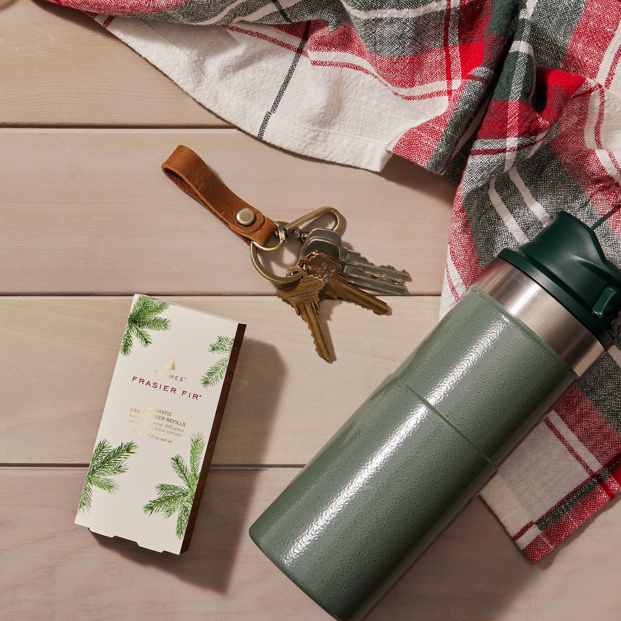 Thymes Frasier Fir Car Diffuser Refill on table