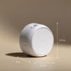 White cylindrical device with 'aqua' branding, shown with dimensions on a beige background