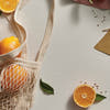 Thymes Mandarin Coriander Reed Diffuser Oil Refill - mandarin oranges on a table
