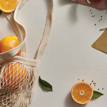 Thymes Mandarin Coriander Reed Diffuser Oil Refill - mandarin oranges on a table