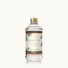 Thymes Frasier Fir diffuser refill bottle on a white background