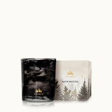 Thymes Noir Woods candle and packaging on a white background
