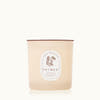 Thymes candle with a label on a white background