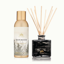 Thymes Noir Woods home fragrance mist and diffuser on a white background