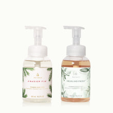 Two bottles of Thymes foaming hand wash with pump dispensers on a white background.
