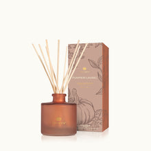 Thymes Pumpkin Laurel petite diffuser with packaging on a white background