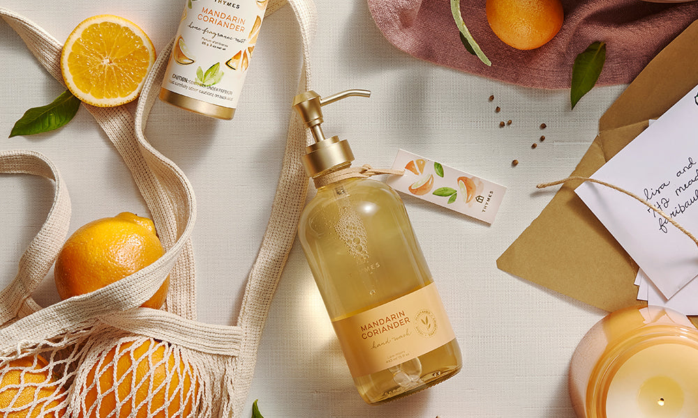 Thymes Mandarin Coriander fragrance collection featuring Large Hand Wash, Candle and Home Fragrance MIst