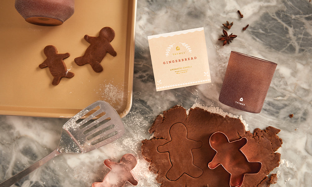 Gingerbread candle with gingerbrad cookie cutouts