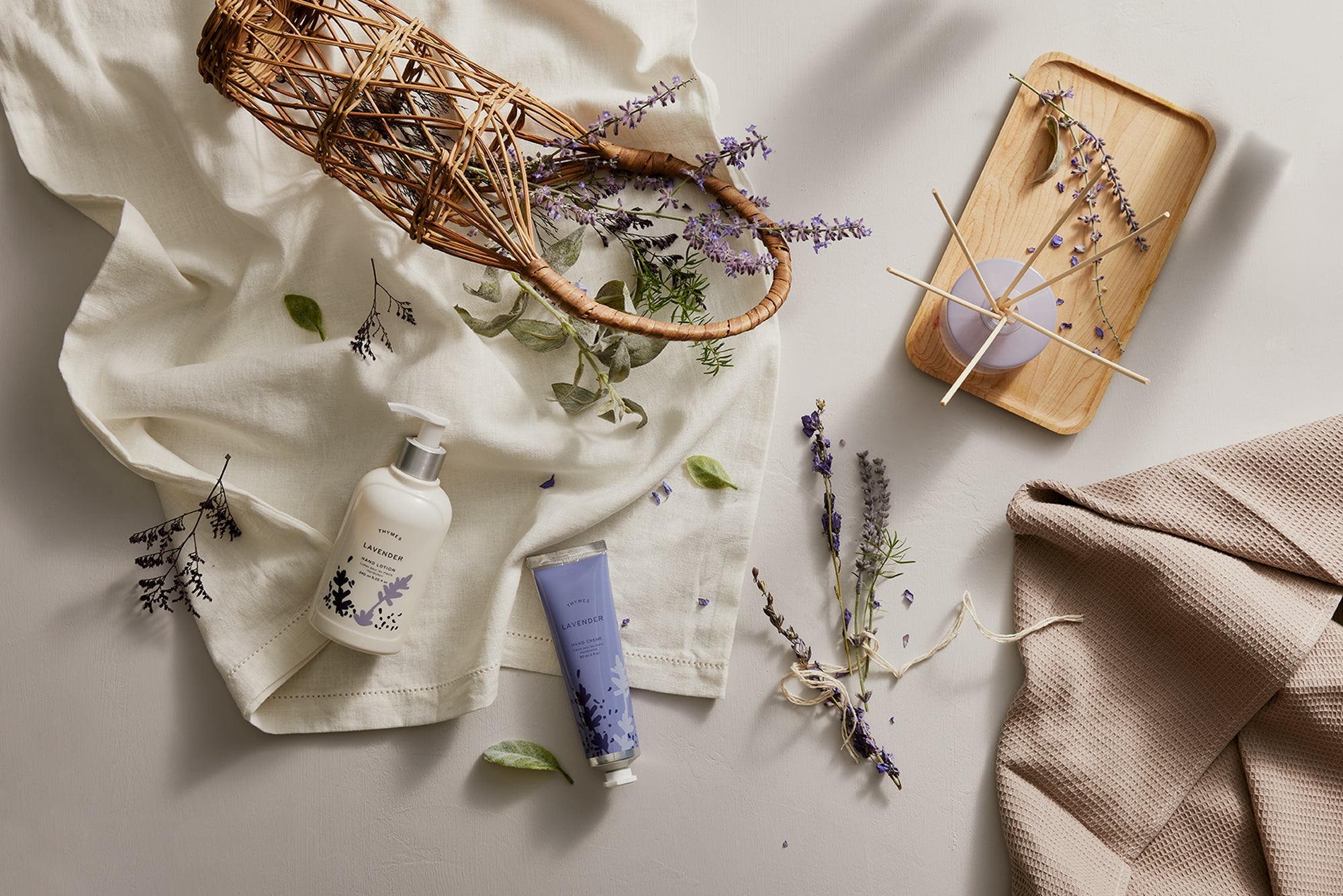 Thymes Lavender fragrance collection featuring hand cream, hand lotion and petite diffuser