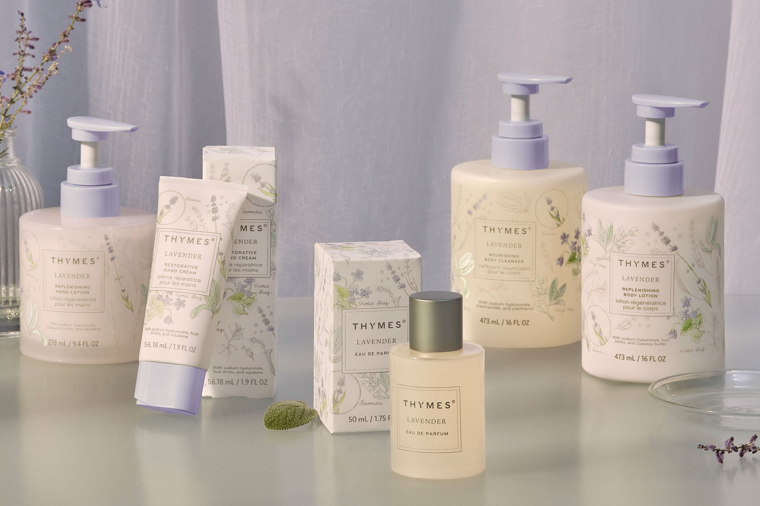 Thymes Lavender fragrance collection featuring hand cream, hand lotion and petite diffuser