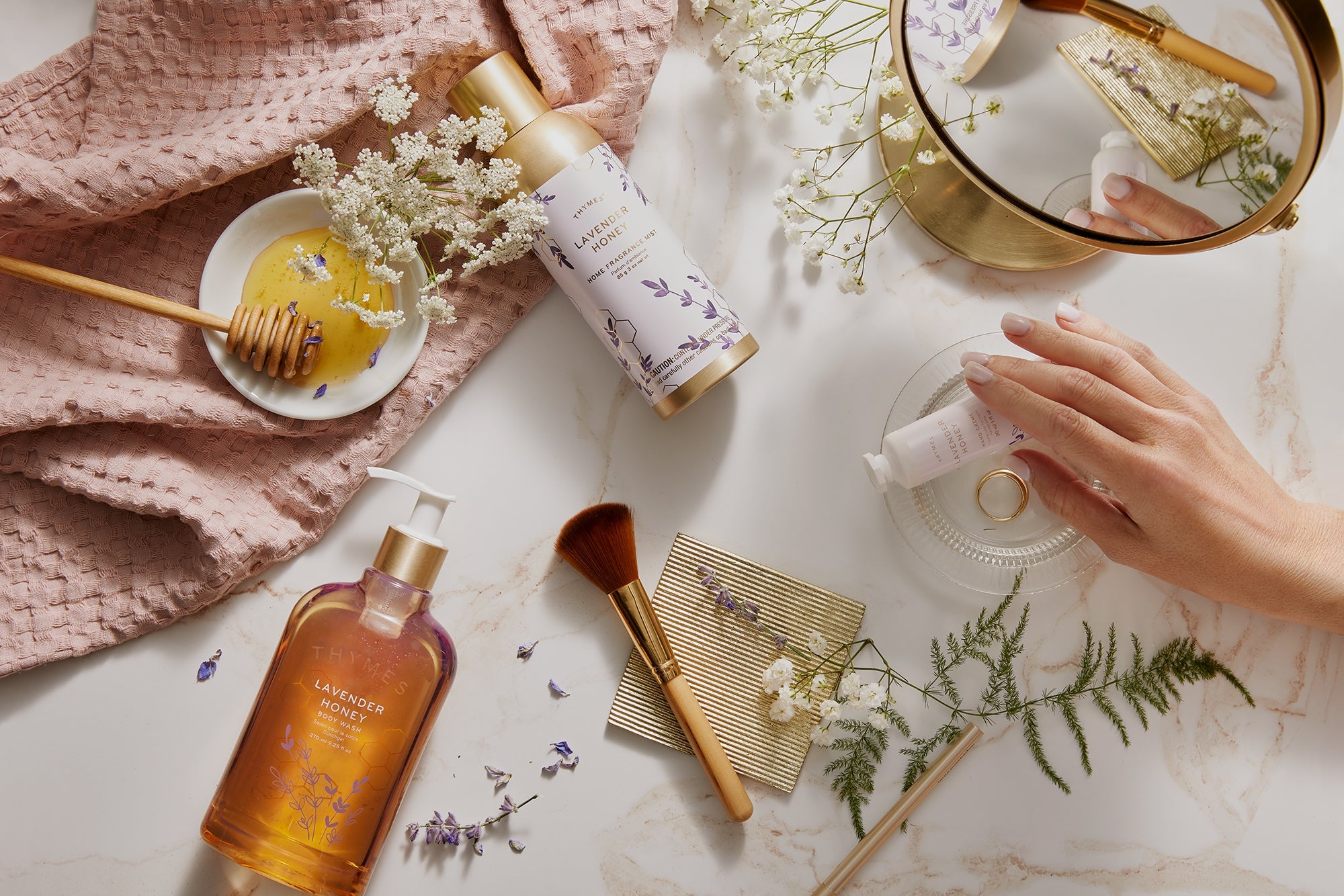 Thymes Lavender Honey fragrance collection featuring home fragrance mist, body wash and hand cream