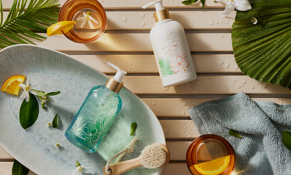 Thymes Neroli Sol fragrance collection featuring body lotion, bar soap and perfume