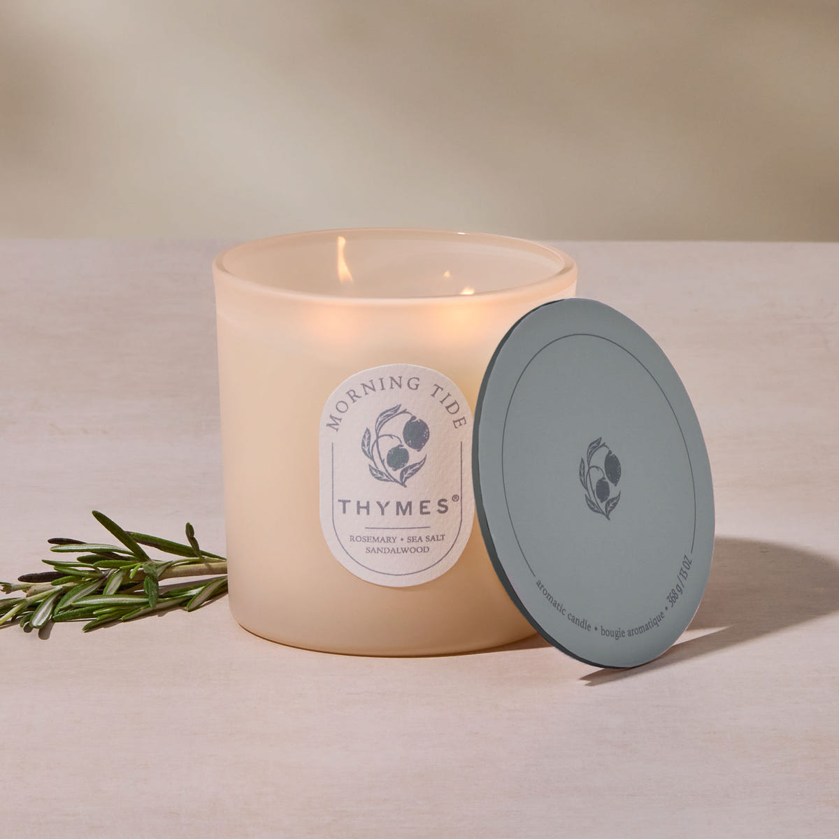 Alternate image of Thymes candle with lid on a neutral background