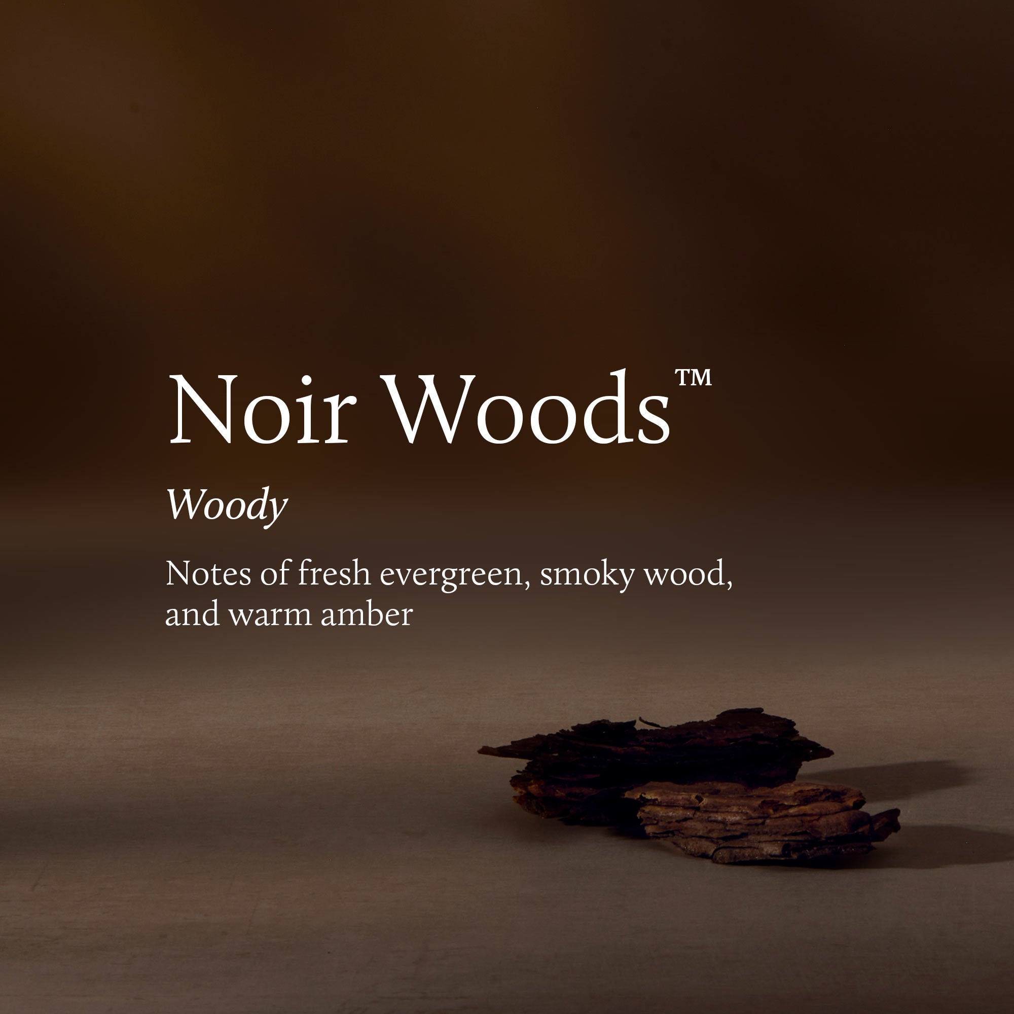 'Noir Woods' with dried wood pieces on a brown background