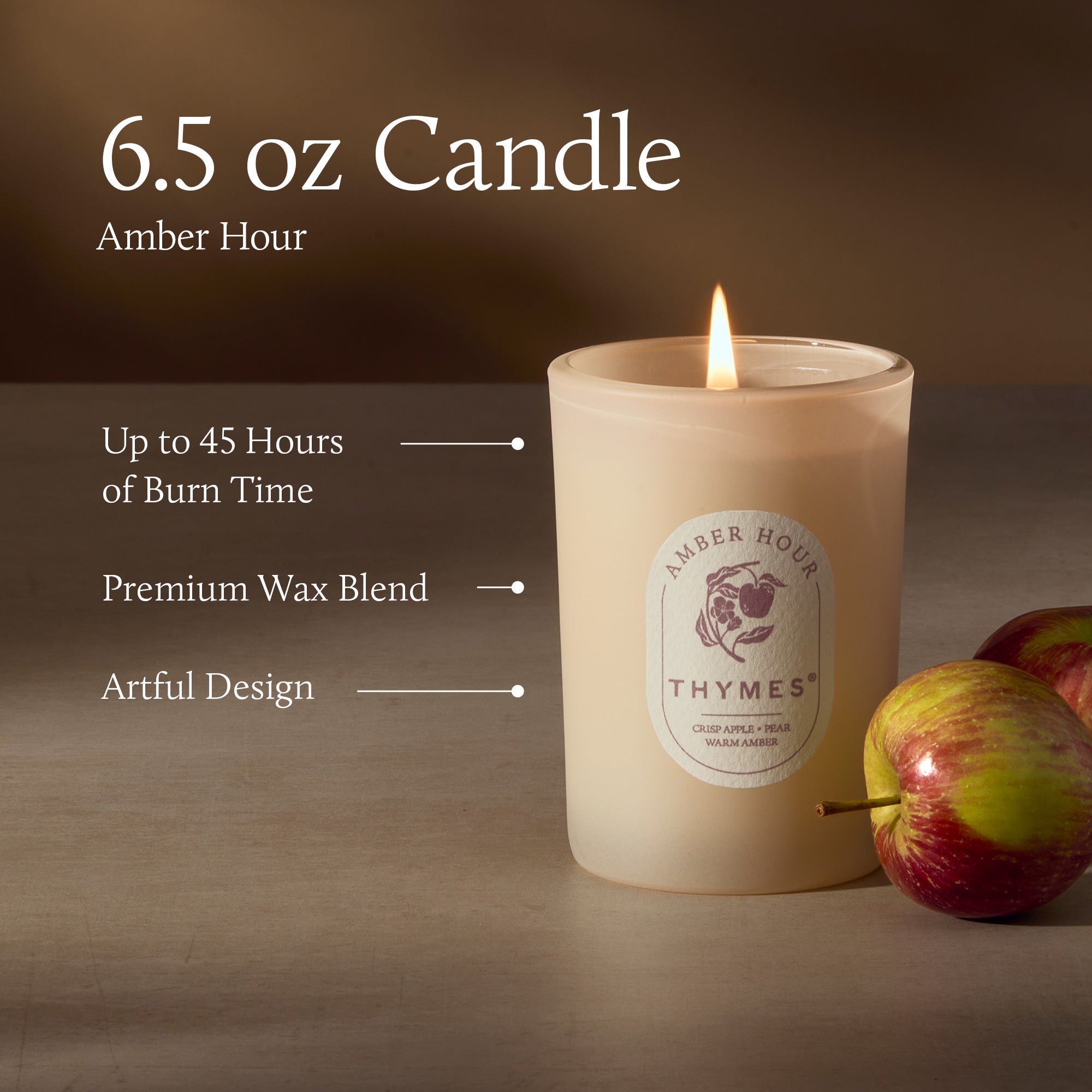 Thymes candle with apples on a brown background