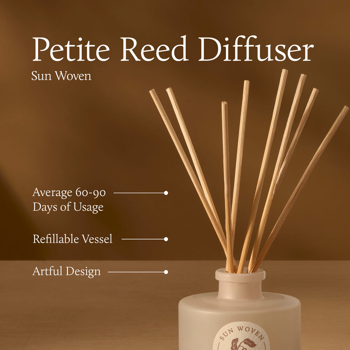 Petite Reed Diffuser with wooden sticks in a white container on a brown background