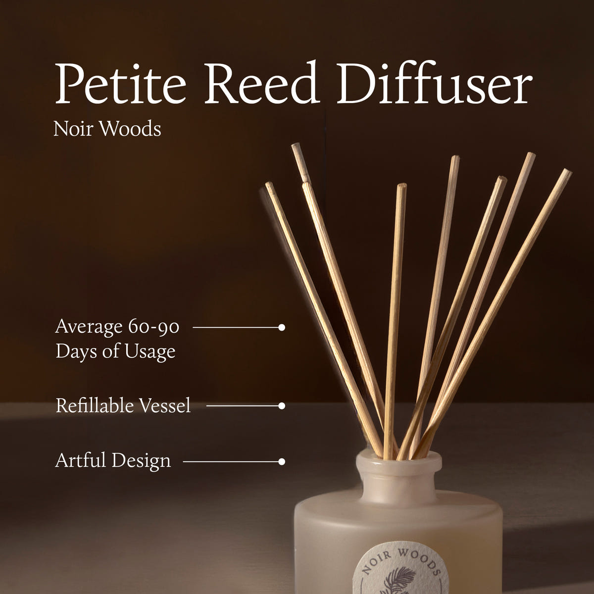 Petite Reed Diffuser with 'Noir Woods' branding on a dark background