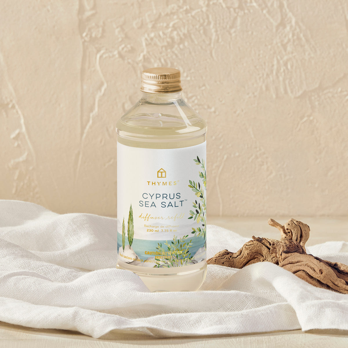 Alternate image of Bottle of Cyprus Sea Salt on a textured surface with a white cloth and driftwood.