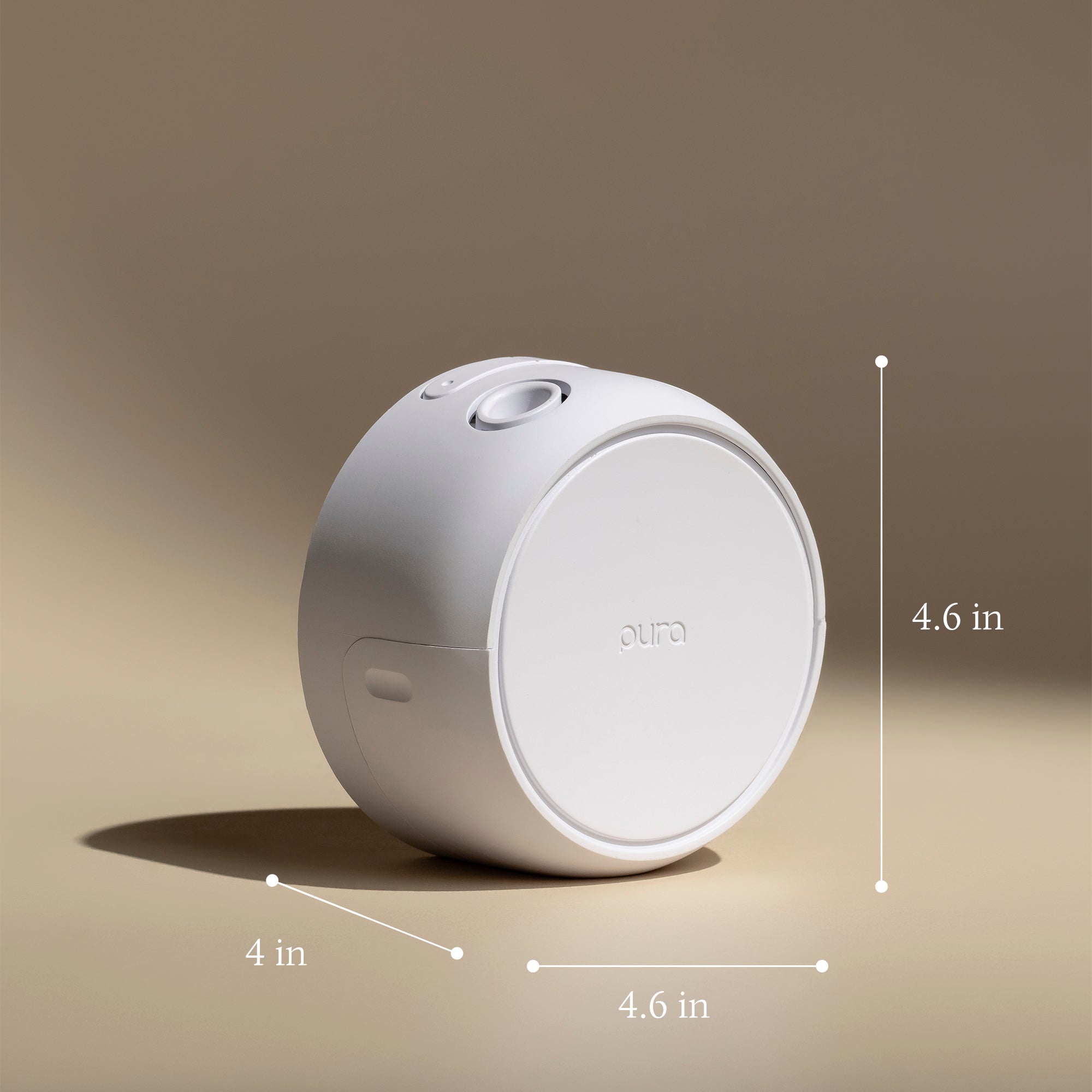 White cylindrical device with 'pura' branding, shown with dimensions on a beige background