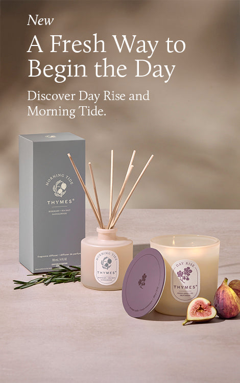 Thymes candles and diffuser with promotional text on a neutral background