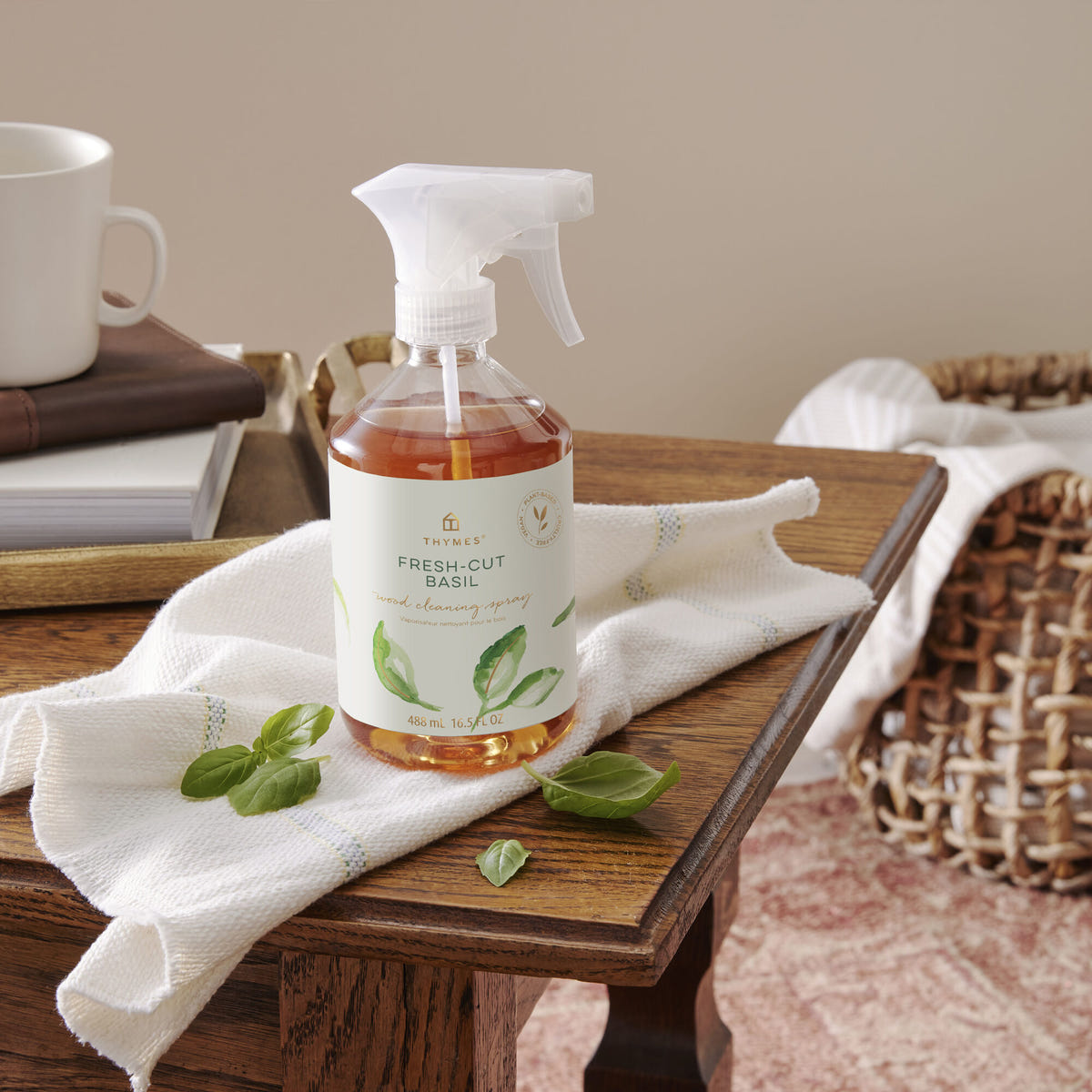 Alternate image of Thymes Fresh Cut Basil Wood Cleaning Spray on table