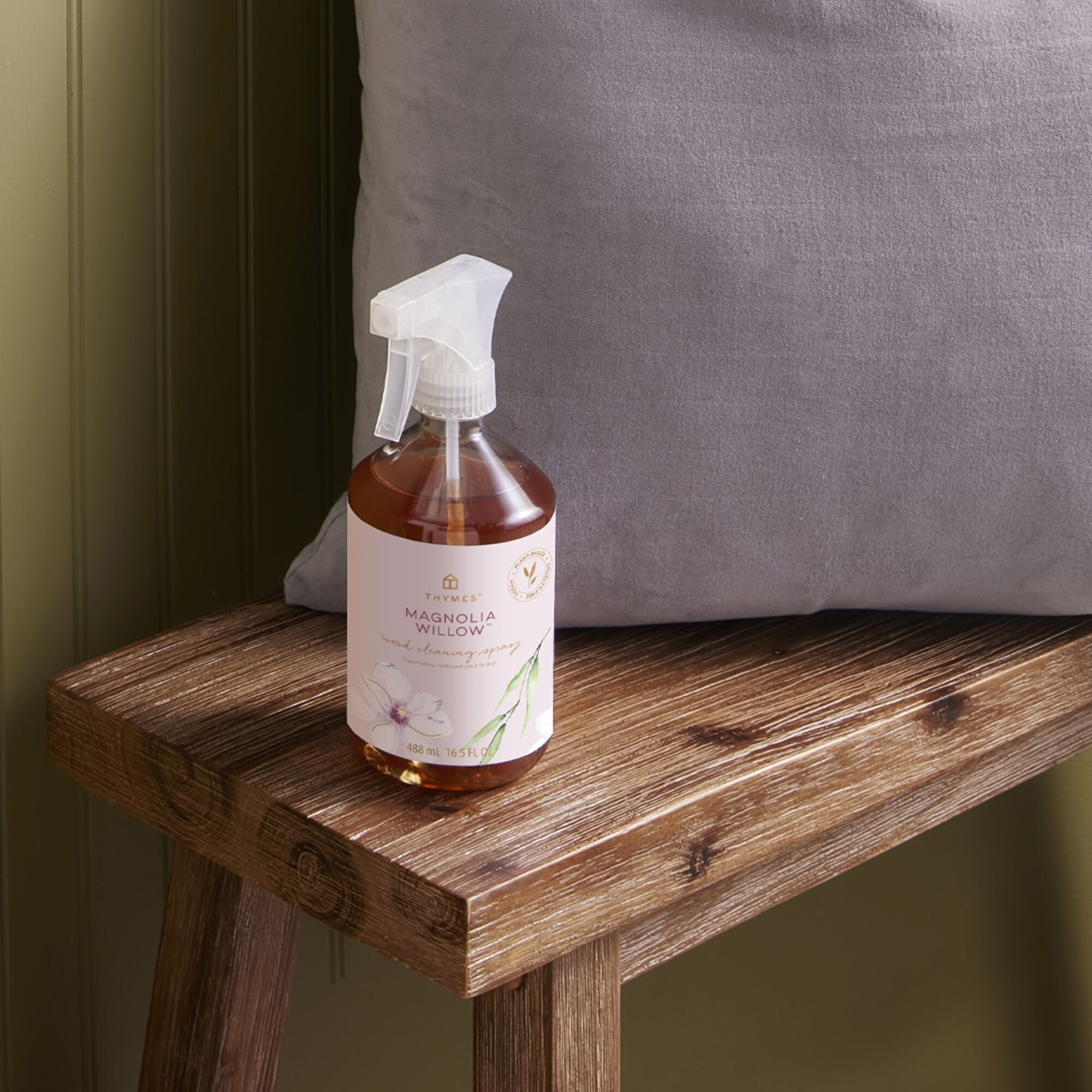 Thymes Magnolia Willow Wood Cleaning Spray on bench