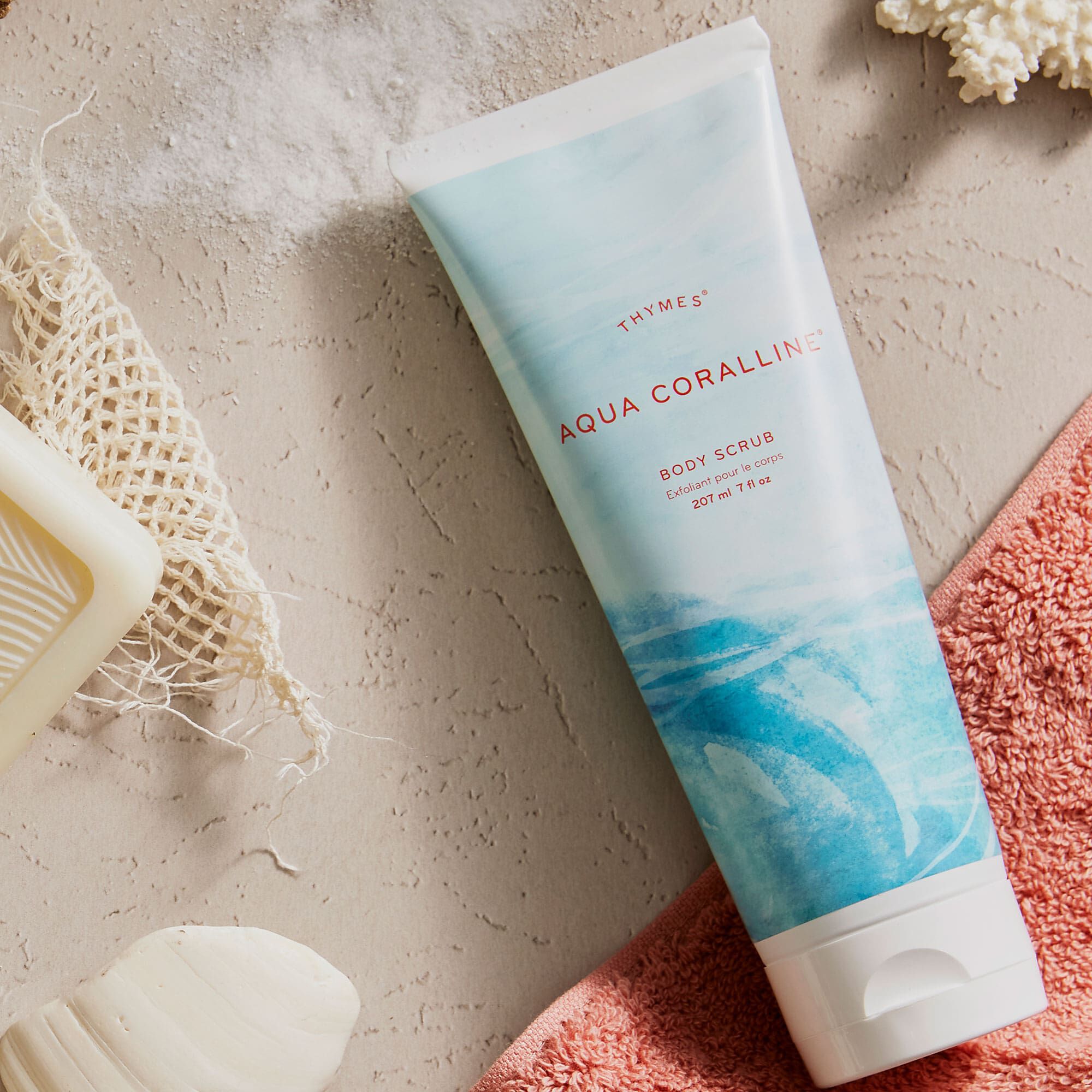 Thymes Aqua Coralline Body Scrub for exfoliation flat lay featured