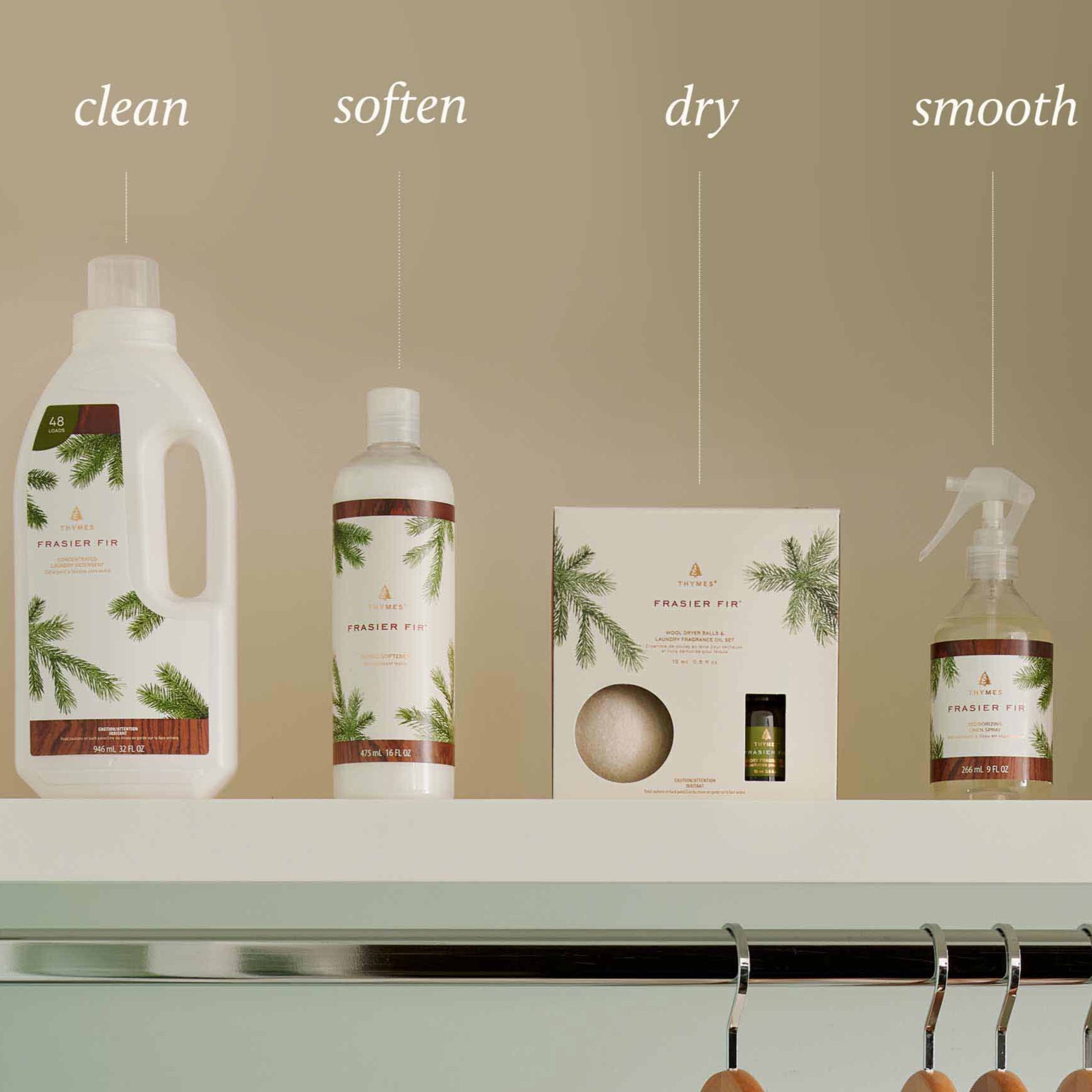 Thymes Frasier Fir Laundry Care Products Labeled Clean, Soften, Dry, Smooth