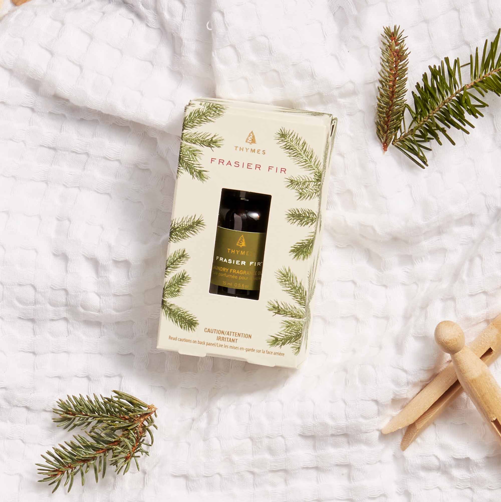 Thymes Frasier Fir Laundry Fragrance Oil in Packaging