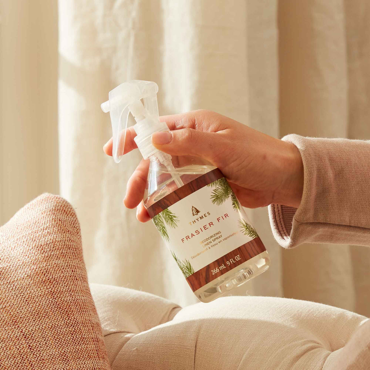 Alternate image of Spraying Pillow with Thymes Frasier Fir Deodorizing Linen Spray