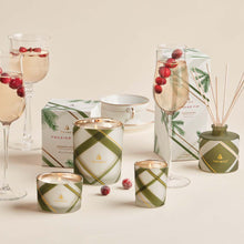 Thymes Frasier Fir Frosted Plaid Collection with votive candle featured