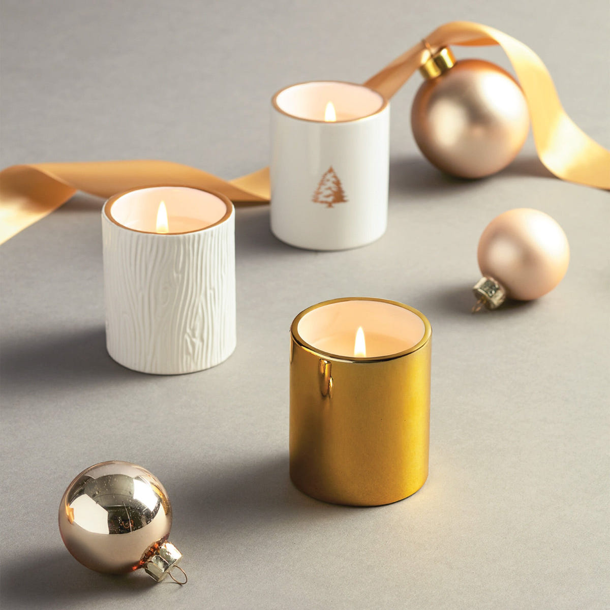 Alternate image of Thymes Frasier Fir Gilded Poured Candle Trio Set Lit on Display