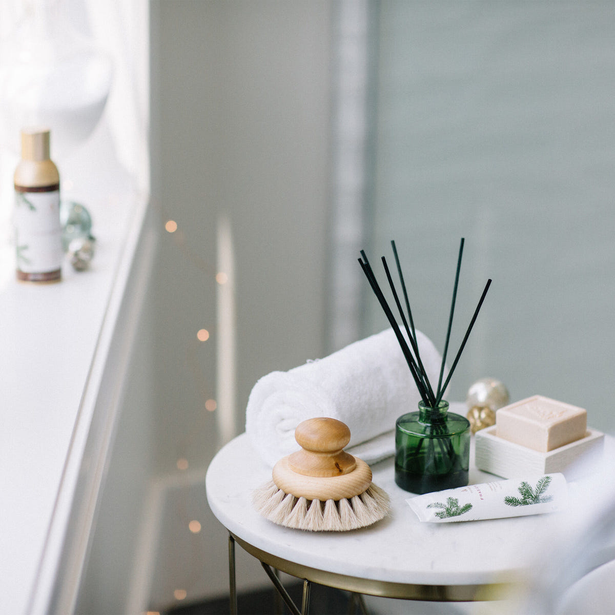 Alternate image of Thymes Frasier Fir Green Reed Diffuser on Bathroom Table