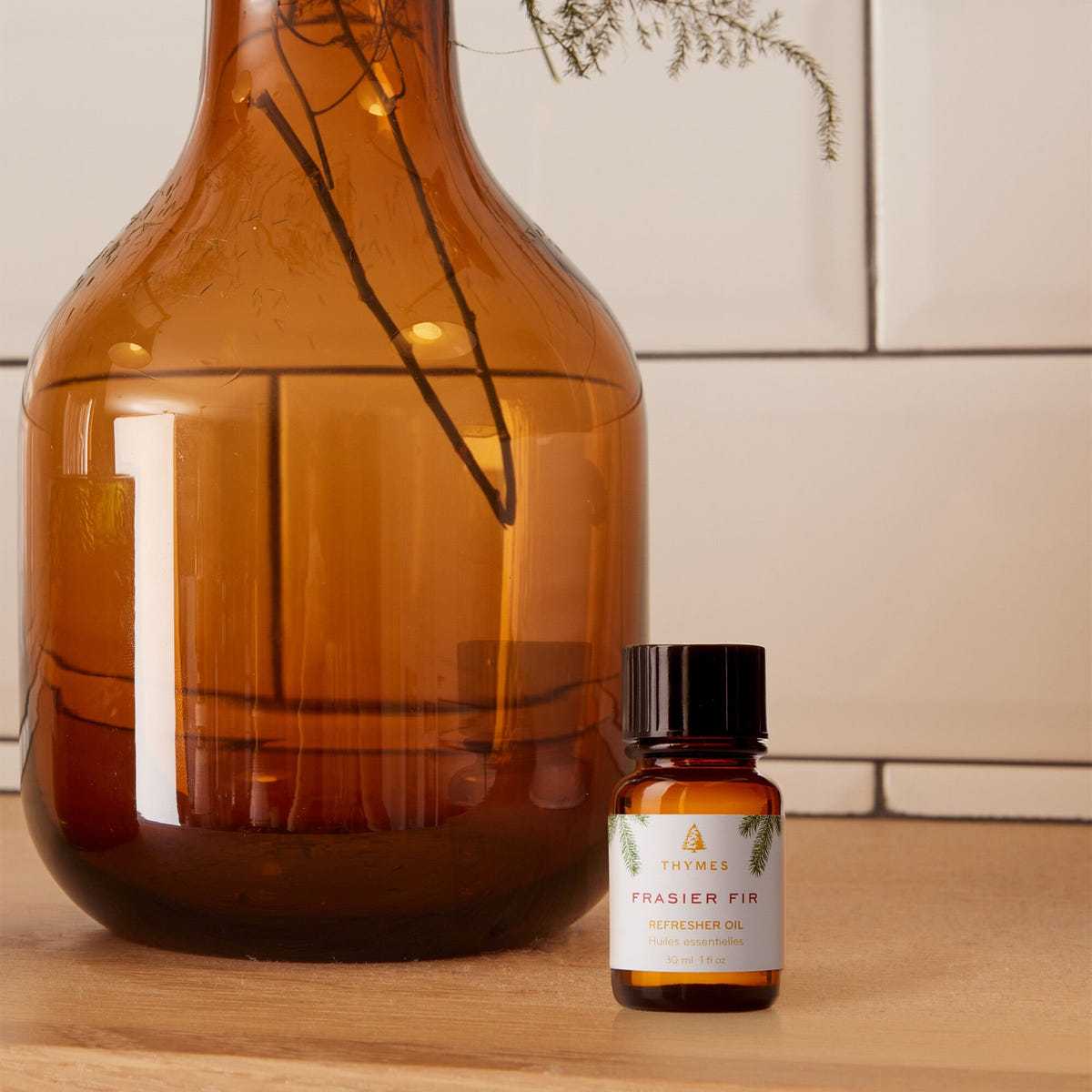 Alternate image of Thymes Frasier Fir Refresher Oil On Counter