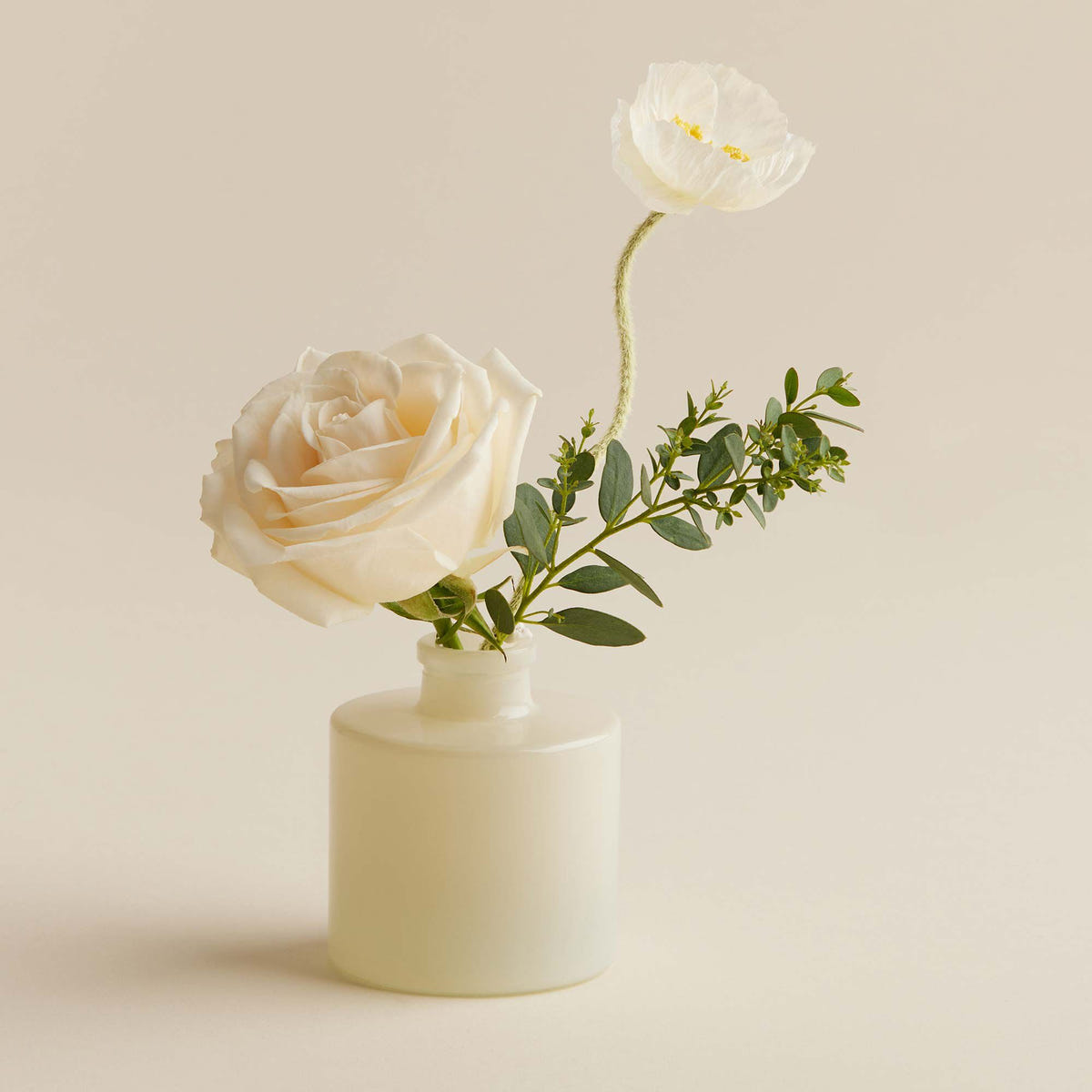 Alternate image of Thymes Goldleaf Petite Reed Diffuser vessel filled with flowers