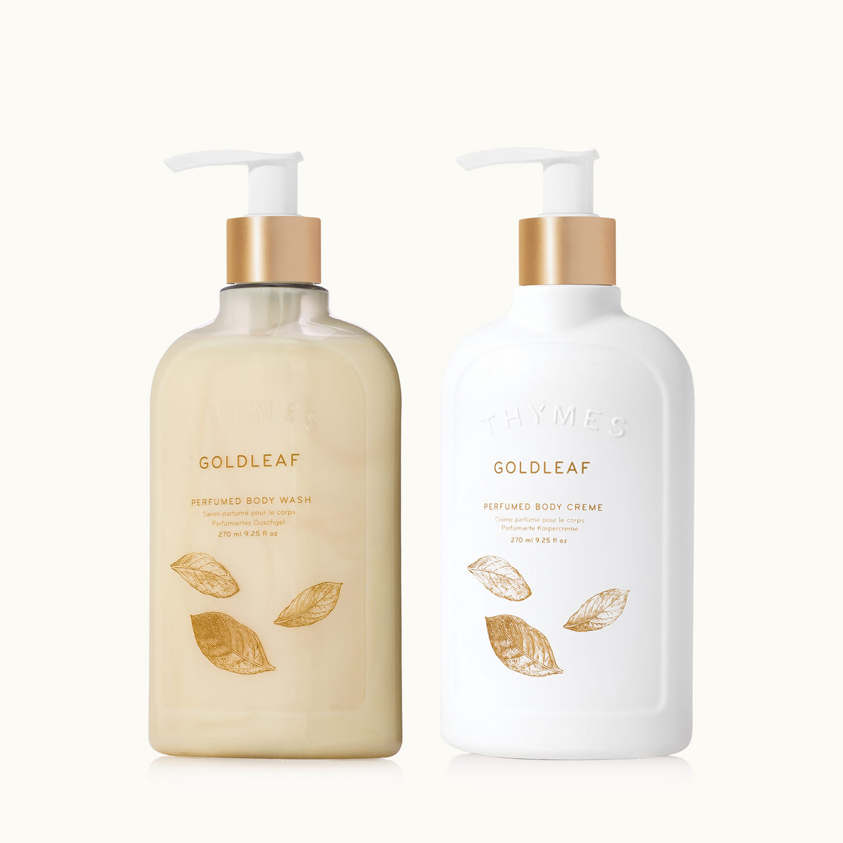 Goldleaf Body Wash and Body Cream on a tan background