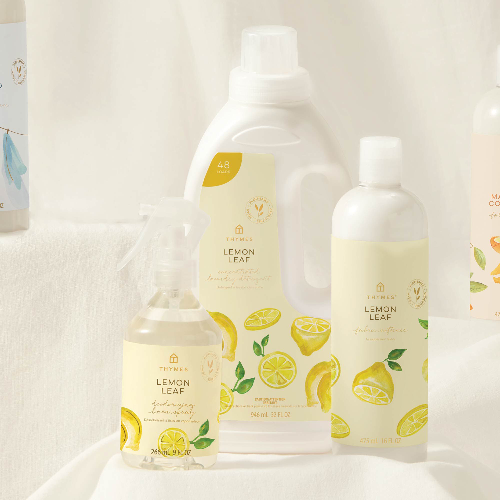 Thymes Lemon Leaf Fabric Softener to Soften Clothing with Citrus Scent featured next to Lemon Leaf laundry care collection