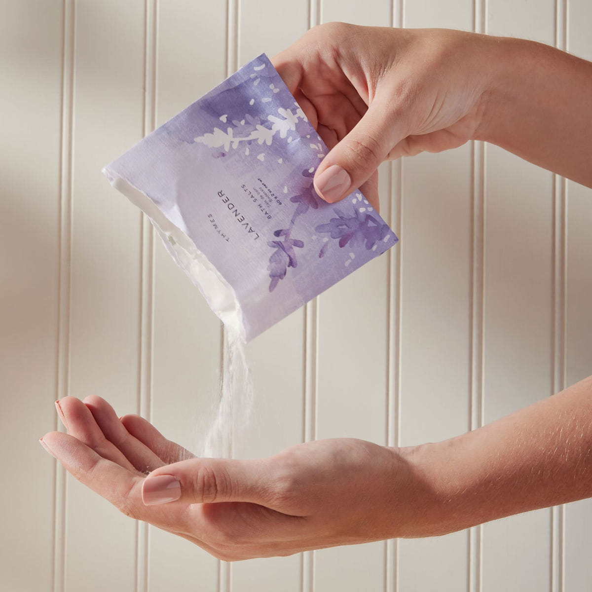 Alternate image of Thymes Lavender Bath Salts with Art Packaging being poured into hand