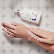 Thymes Lavender Body Lotion applying on hands