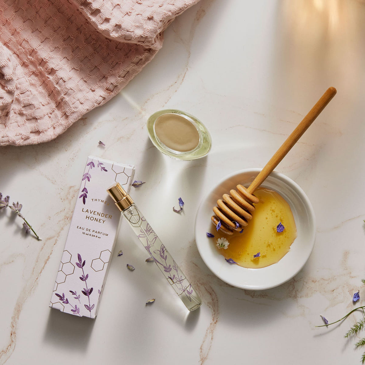 Alternate image of Thymes Lavender Honey Eau de Parfum Spray Pen is a Travel Sized Floral Fragrance flat lay with honey drizzle