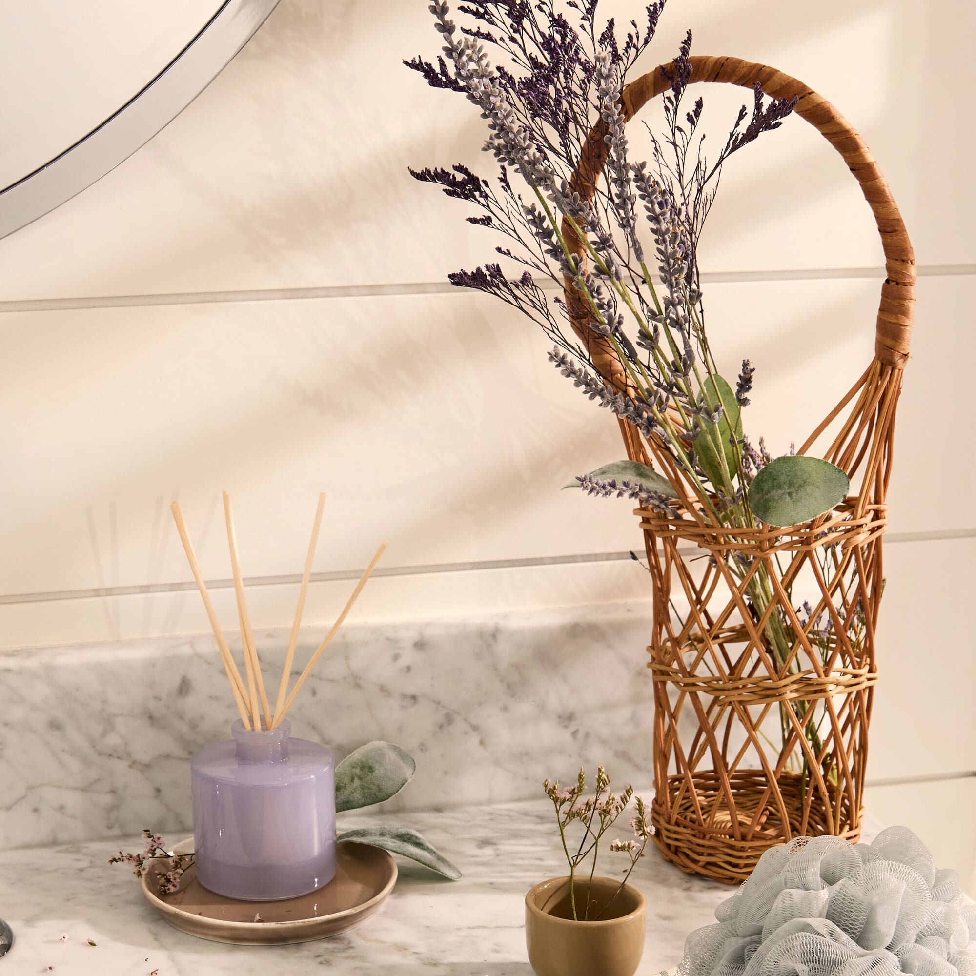 Thymes Lavender Petite Reed Diffuser on bathroom vanity