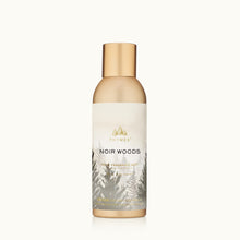 Thymes Noir Woods fragranced mist bottle on a white background