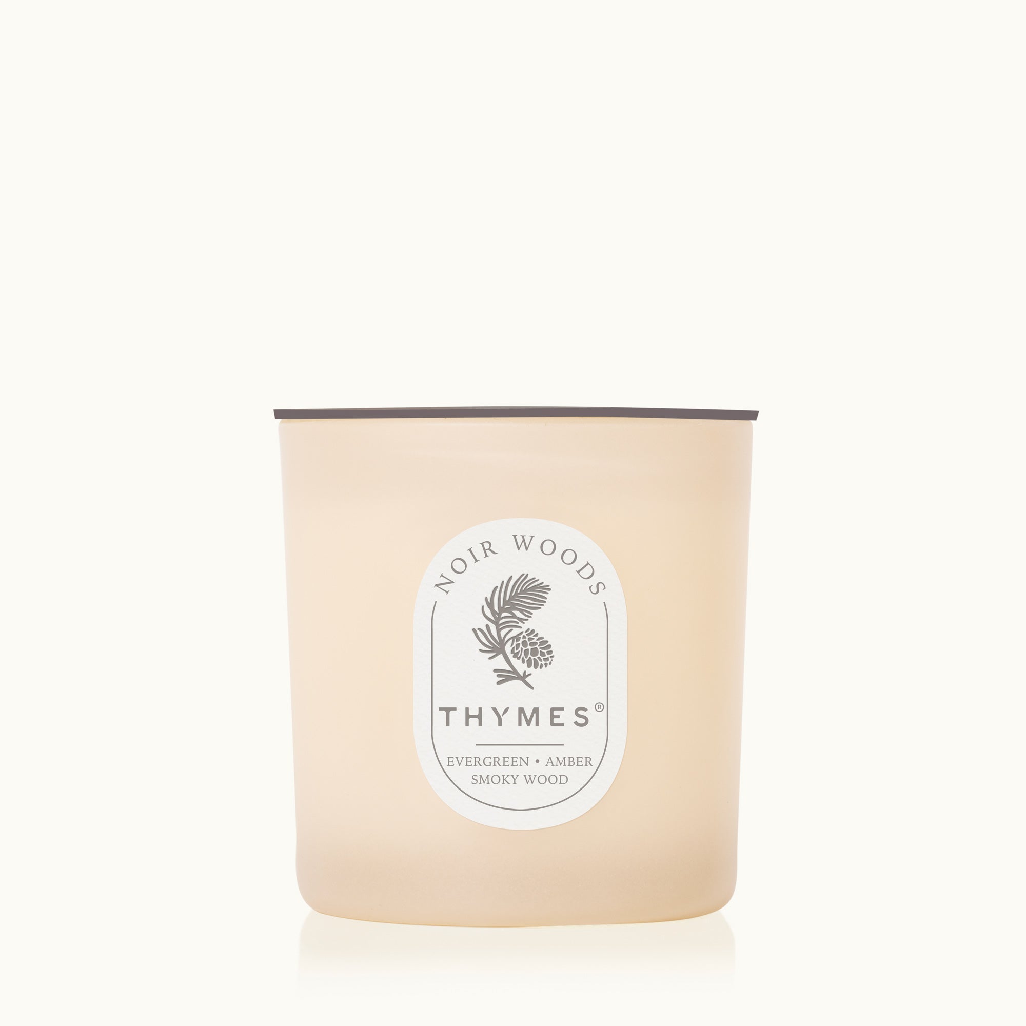 Thymes candle with a label on a white background