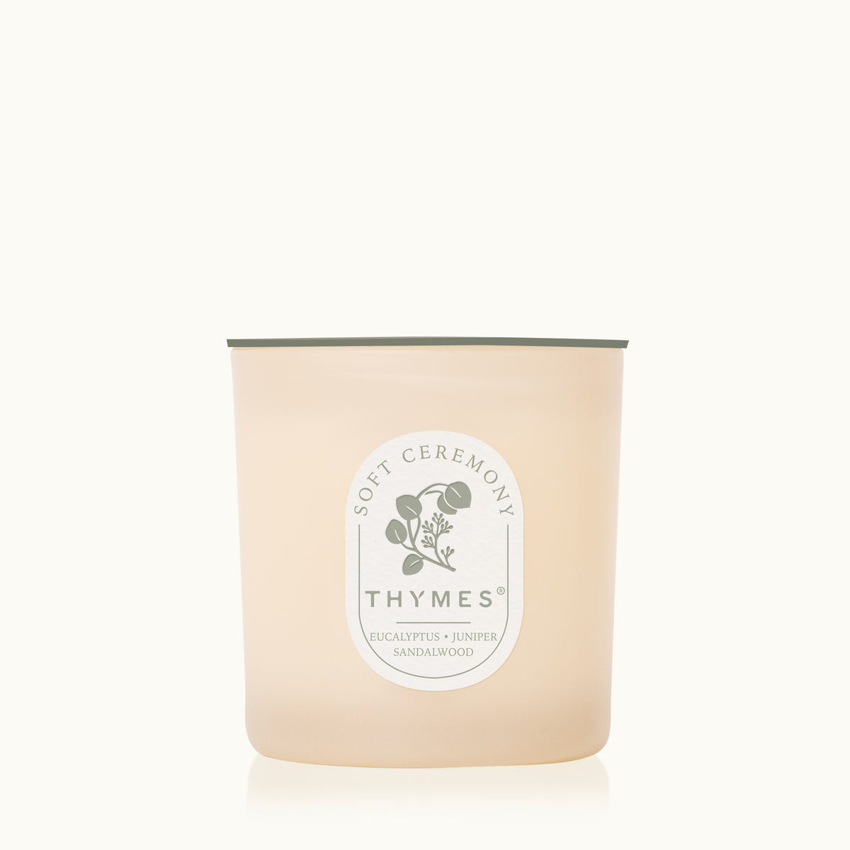 Thymes candle with a label on a white background