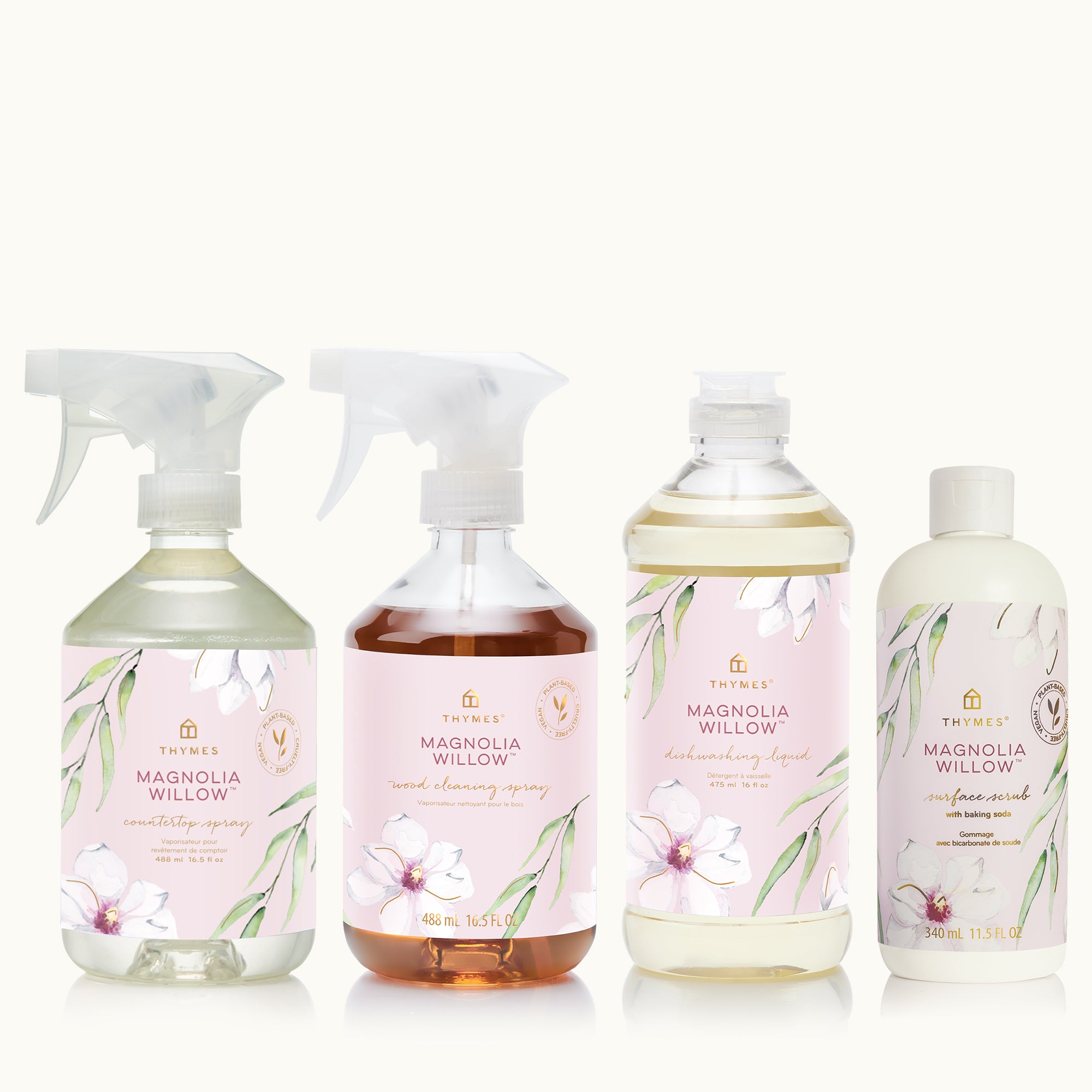 Set of Thymes Magnolia Willow products including bottles and sprays on a tanbackground