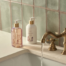 Thymes Sienna Sage Hand Lotion and Hand Wash Beside Sink