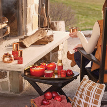 Thymes Simmered Cider Collection Displayed Outdoors