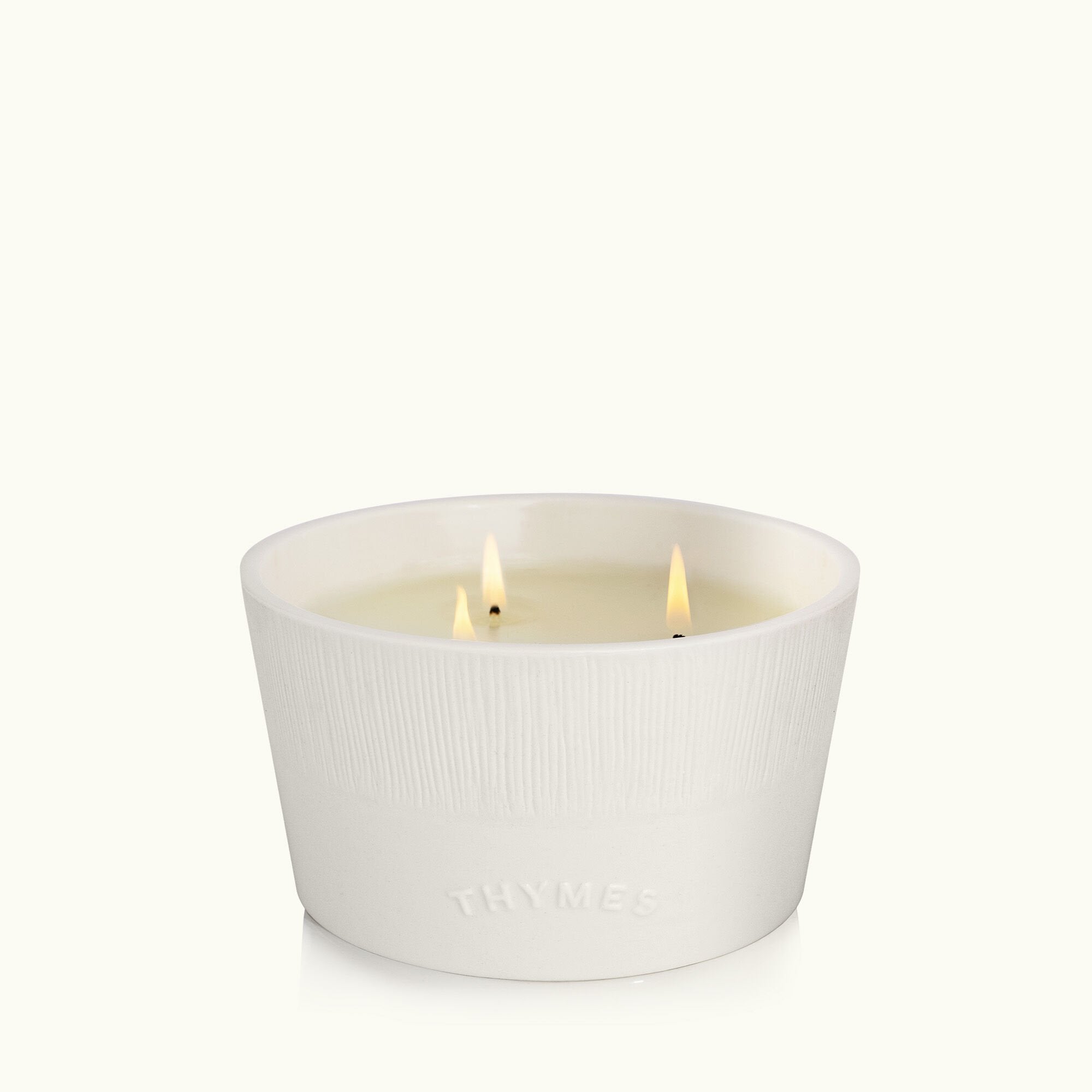 Thymes Olive Leaf 3-Wick Candle burning