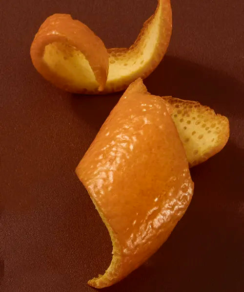 Close up of two mandarin orange peels.