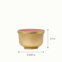A metallic, gold finish candle tin with a height of 2.5 inches and a diameter of 3.5625 inches